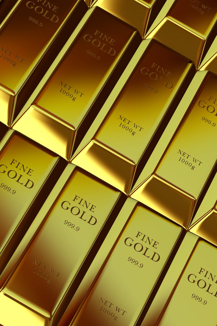 Shiny gold bars stacked, symbolizing wealth, investment, and financial stability.